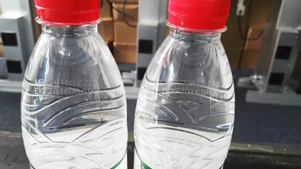 Machine de codage laser pour bouteilles en PET